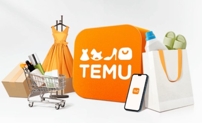Einkaufswagen, Handy und Einkaufstasche mit verschiedenen Produkten